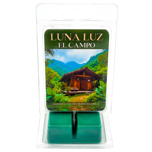 Luna Luz El Campo wax melt packaging with a rustic tropical home set in Puerto Rico mountains. Wax melt set on a white background.