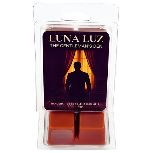 Luna Luz "The Gentlemans Den" wax melt packaging with a silhouette of a man in front of a curtain.