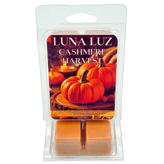 Luna Luz Cashmere Harvest wax melts packaging with pumpkins on a white background